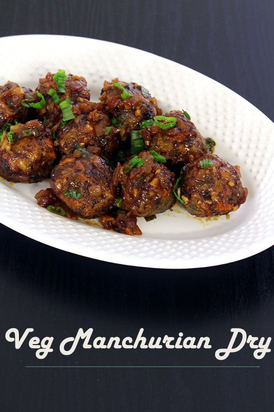 Veg manchurian dry garnished with spring onion greens.