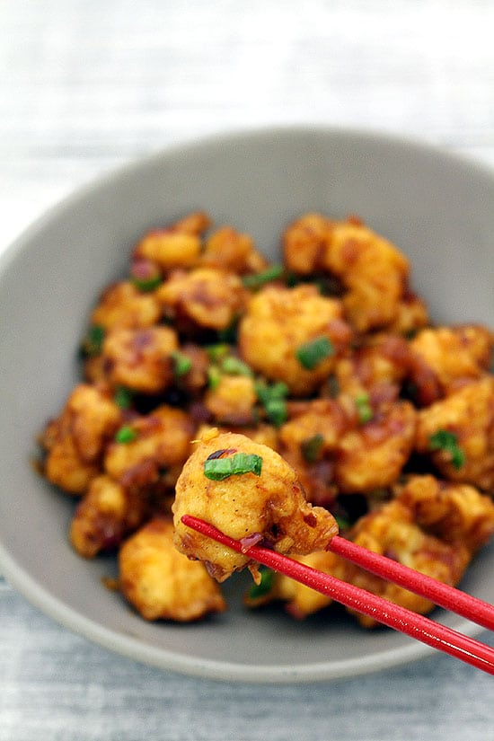 gobi manchurian picked up using chopsticks.