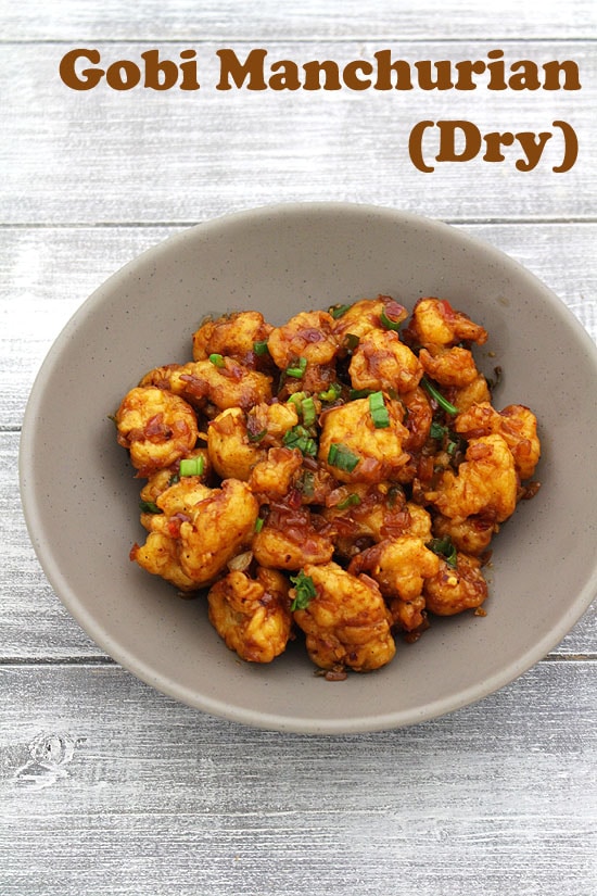 Gobi Manchurian garnished with spring onion greens.