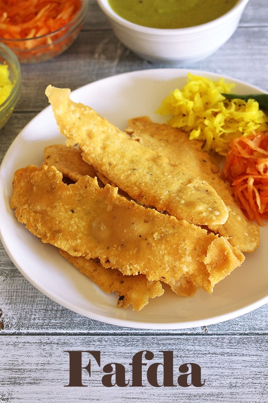 Fafda served with papaya sambharo.