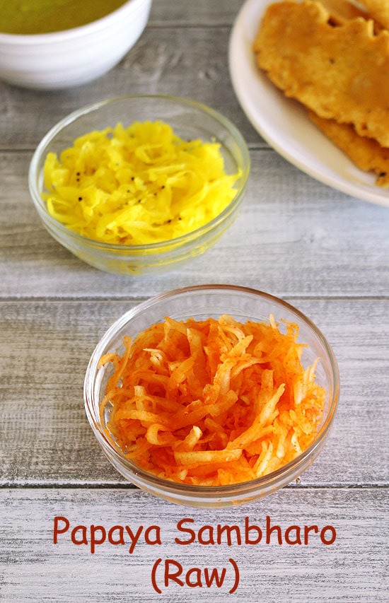 2 bowls of papaya sambharo served with fafda and fafda chutney.