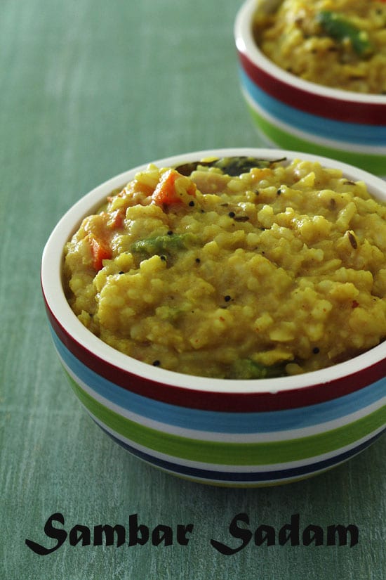 Sambar sadam served in a bowl and another bowl in the back.