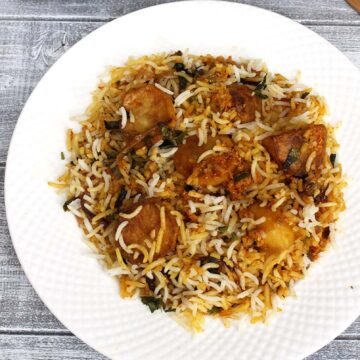 Baby Potato Biryani Recipe (How to make Dum Aloo Biryani)