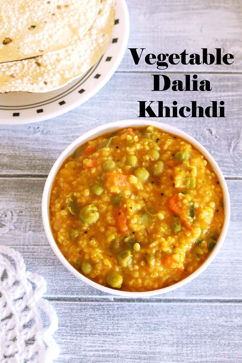 Dalia khichdi served with papad and label on the image.