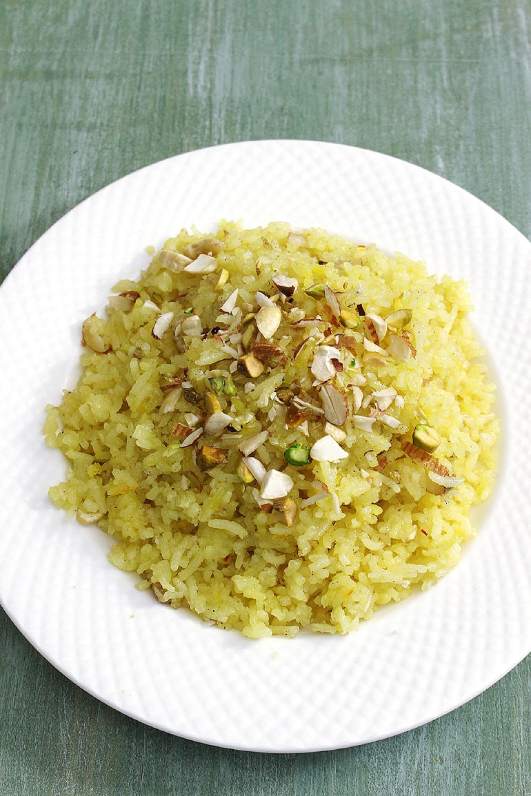 Zarda rice garnished with nuts.