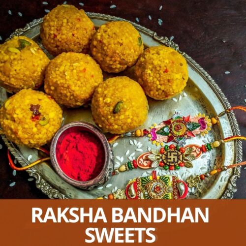 boondi ladoo, kumkum and 3 rakhi on oval plate with text raksha bandhan sweets at the bottom