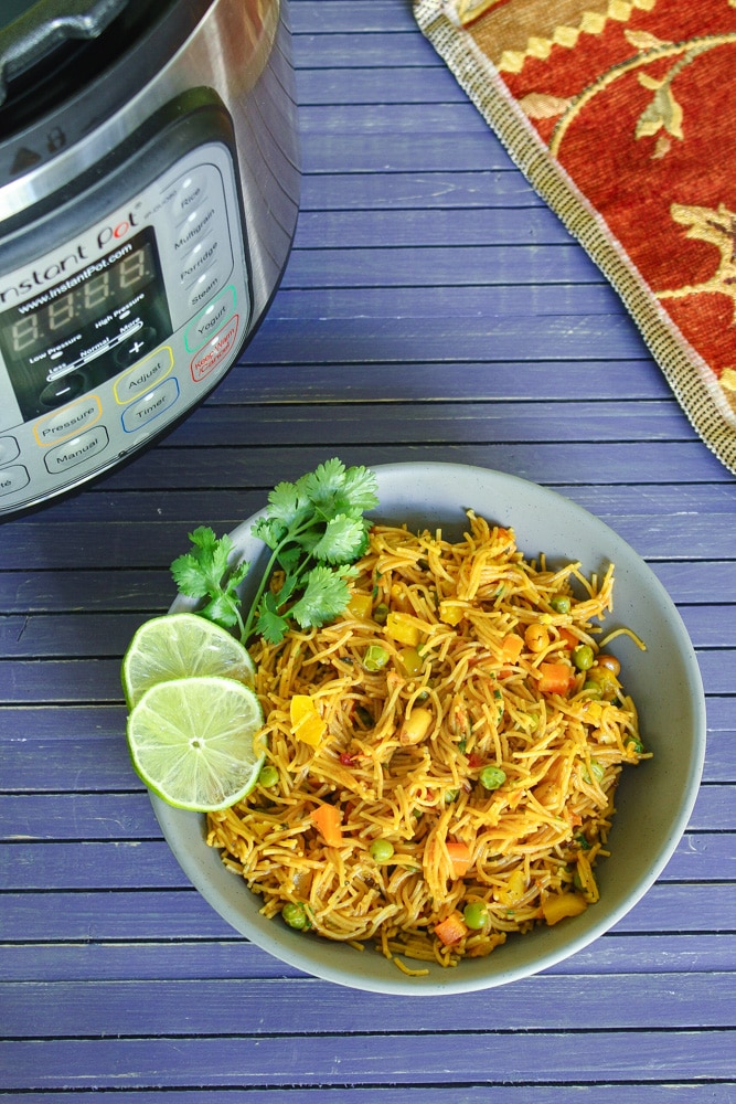 Instant Pot Vermicelli Pulao Served with lemon slices.