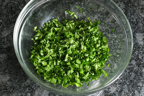 chopped cilantro leaves in a bowl