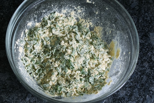 flour and cilantro leaves are thoroughly mixed.