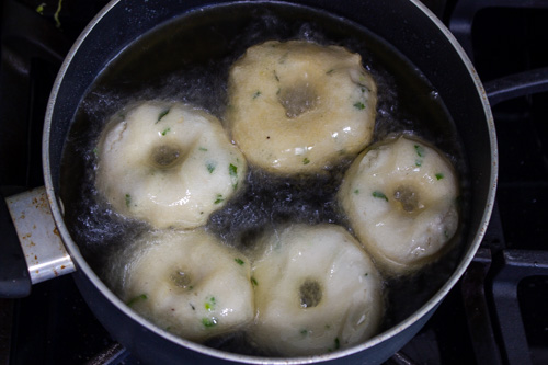 frying the vada in hot oil
