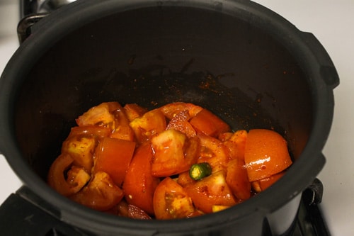 tomato and chili mixture in the pressure cooker