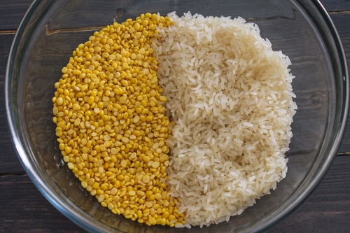 yellow moong dal and rice in a bowl for khichdi