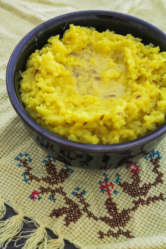 Moong dal khichdi with a ghee on top.