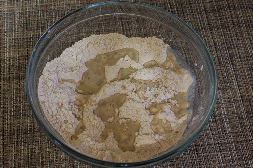 adding water to knead the poori dough