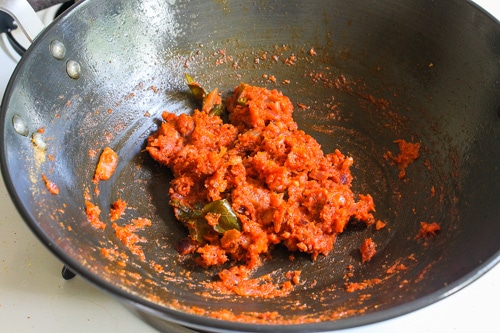 freshly ground masala mixed with cooked tomatoes