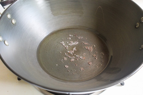 tempering mustard seeds in the oil