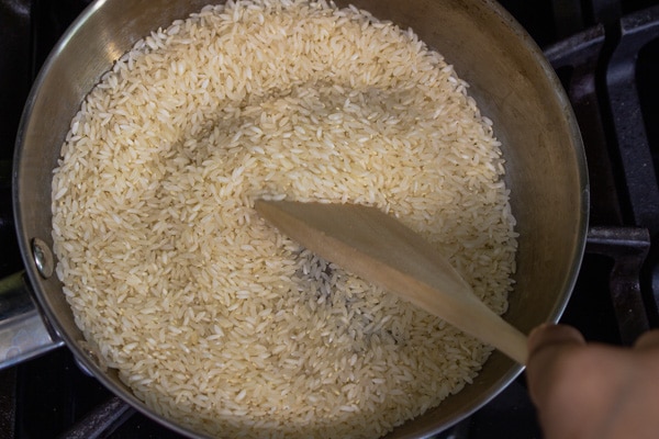 Roasting rice for ven pongal