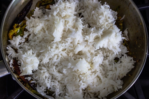 adding cooked rice