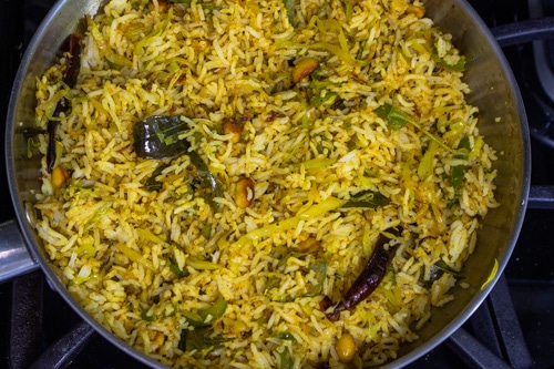 rice is mixed with spiced cabbage mixture