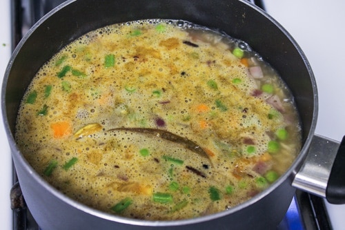 adding water to make pulao recipe