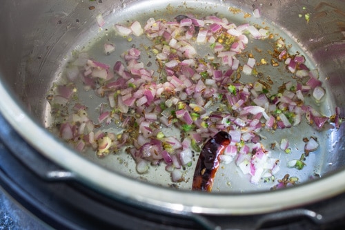 saute whole spices and onion in instant pot