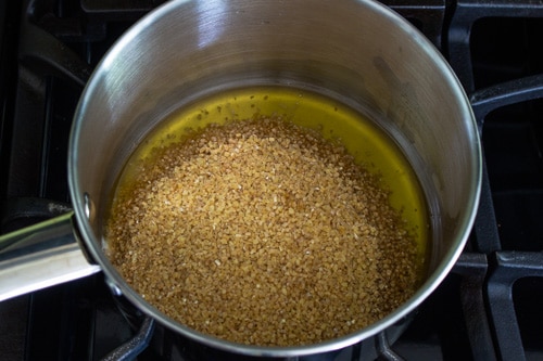 adding cracked wheat in ghee