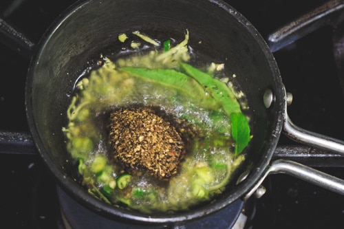 adding cumin-pepper powder