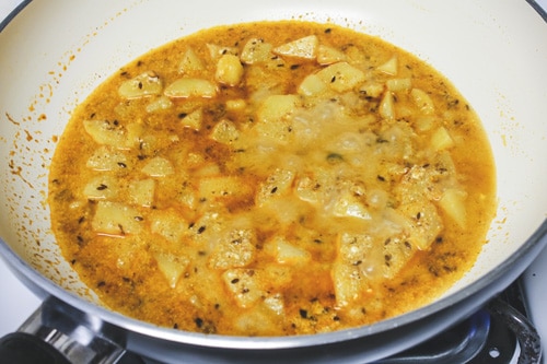 simmering dahi aloo curry