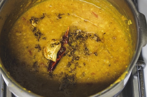 adding tempering to the dal tadka