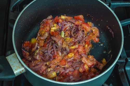 adding tomatoes