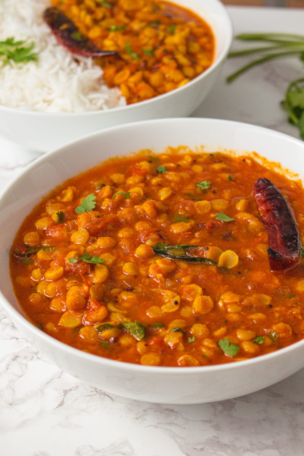 Chana dal in a white bowl.