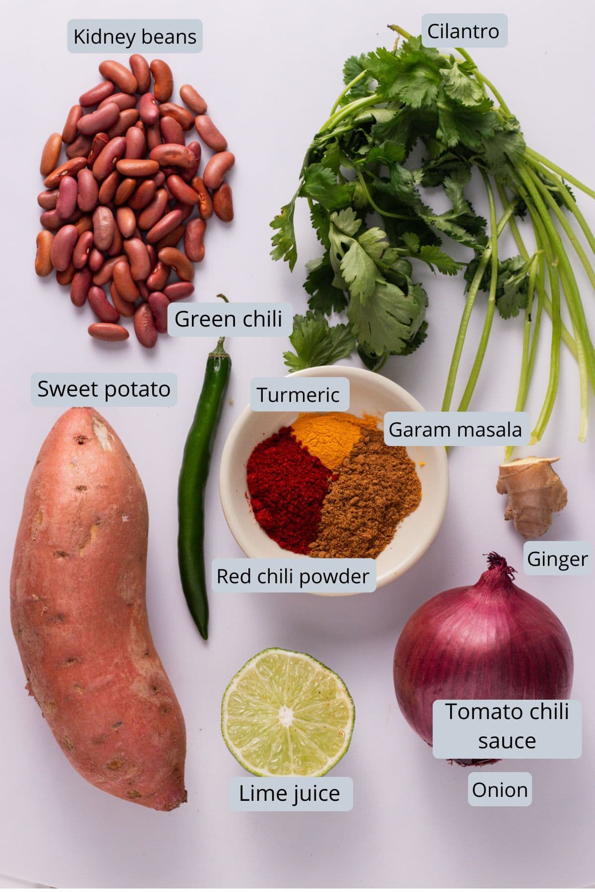 Kidney bean burger ingredients on a white surface.