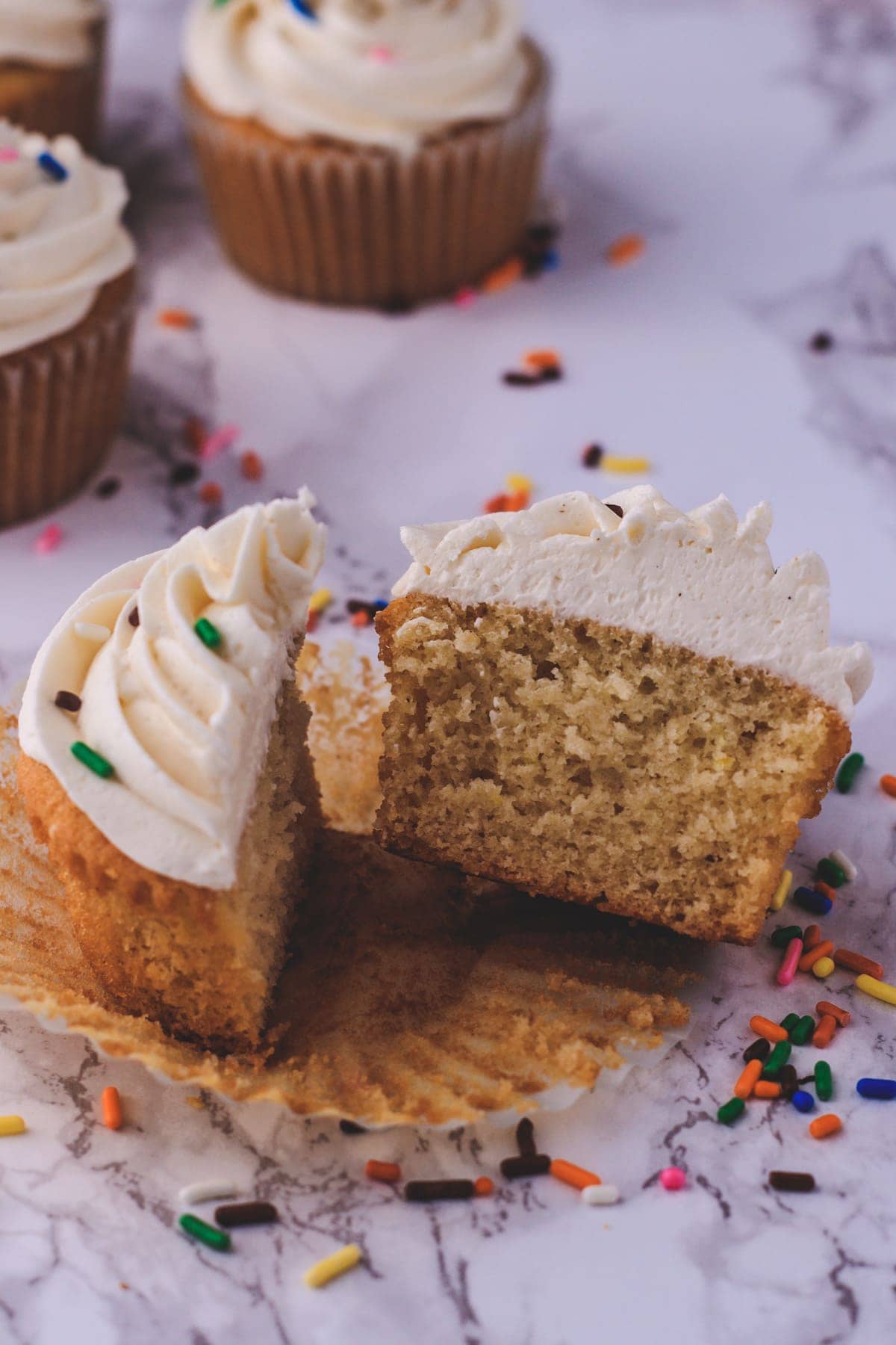 eggless vanilla cupcake cut into half