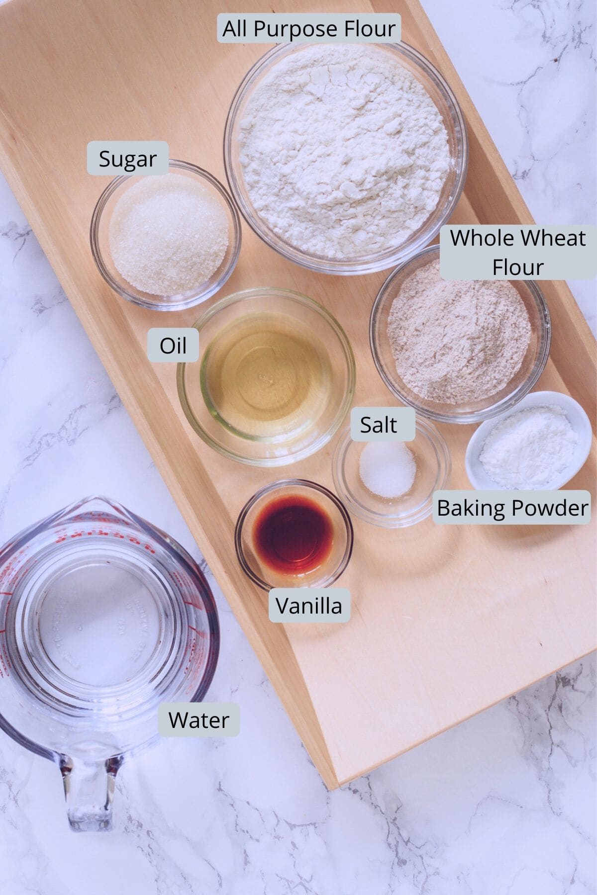 ingredients in individual bowls for vegan waffles