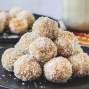 stack of coconut ladoos on the plate