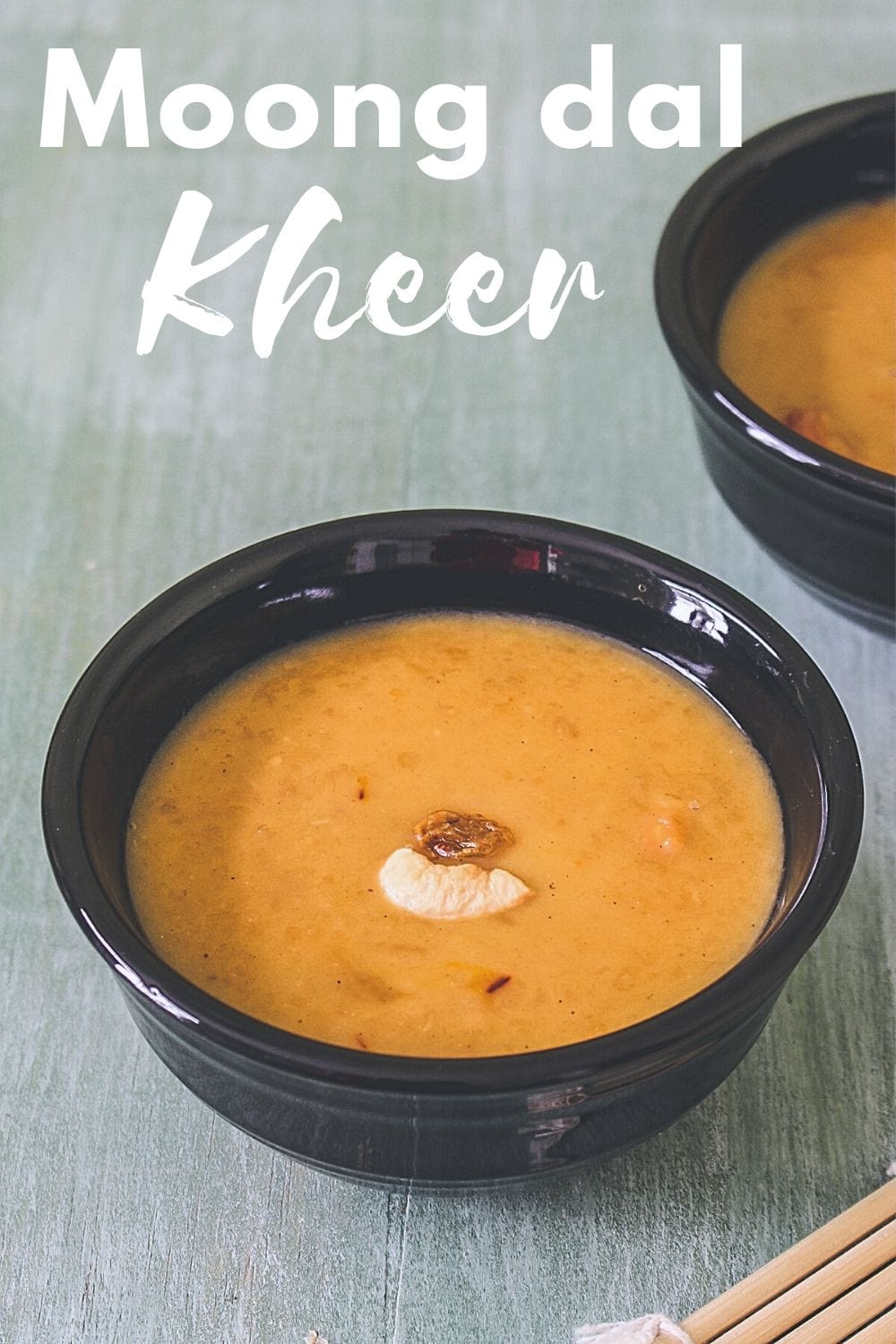 paruppu payasam in a bowl with fried cashew, raisin garnish with text on top of the image