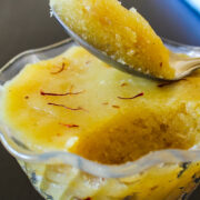 Badam halwa take with a spoon ready to eat