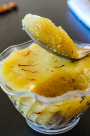 Badam halwa take with a spoon ready to eat