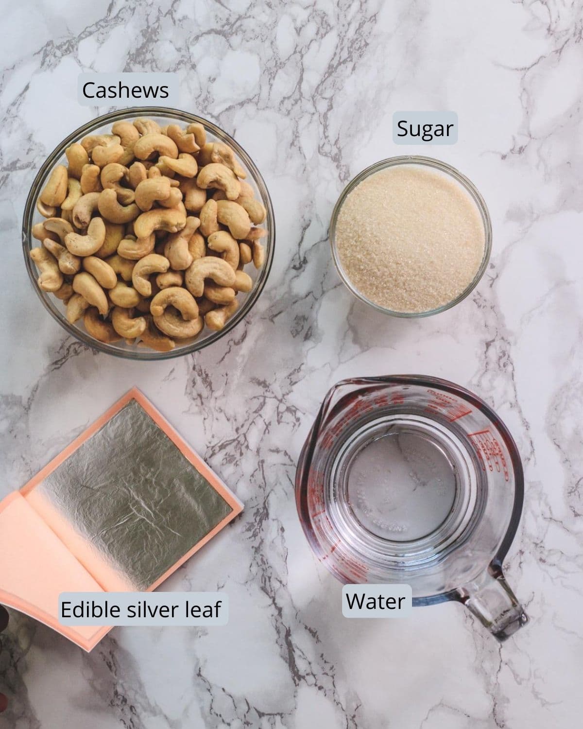 Ingredients used in kaju katli recipe includes cashew nuts, sugar, water and silver leaf.