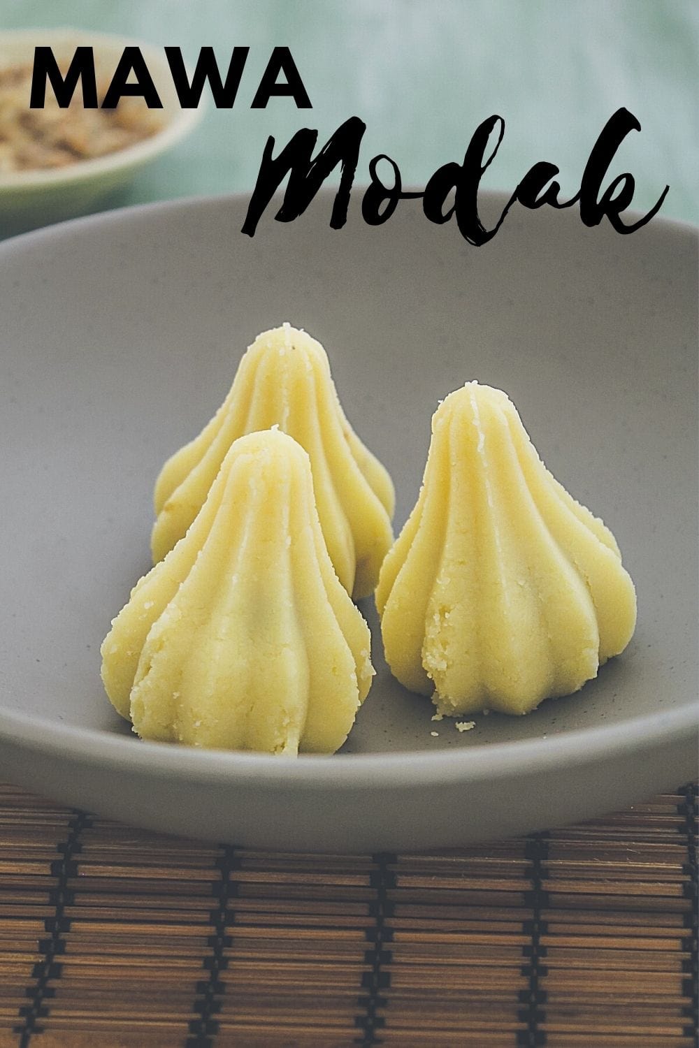 three mawa modak in a plate with text 'mawa modak' for pinterest