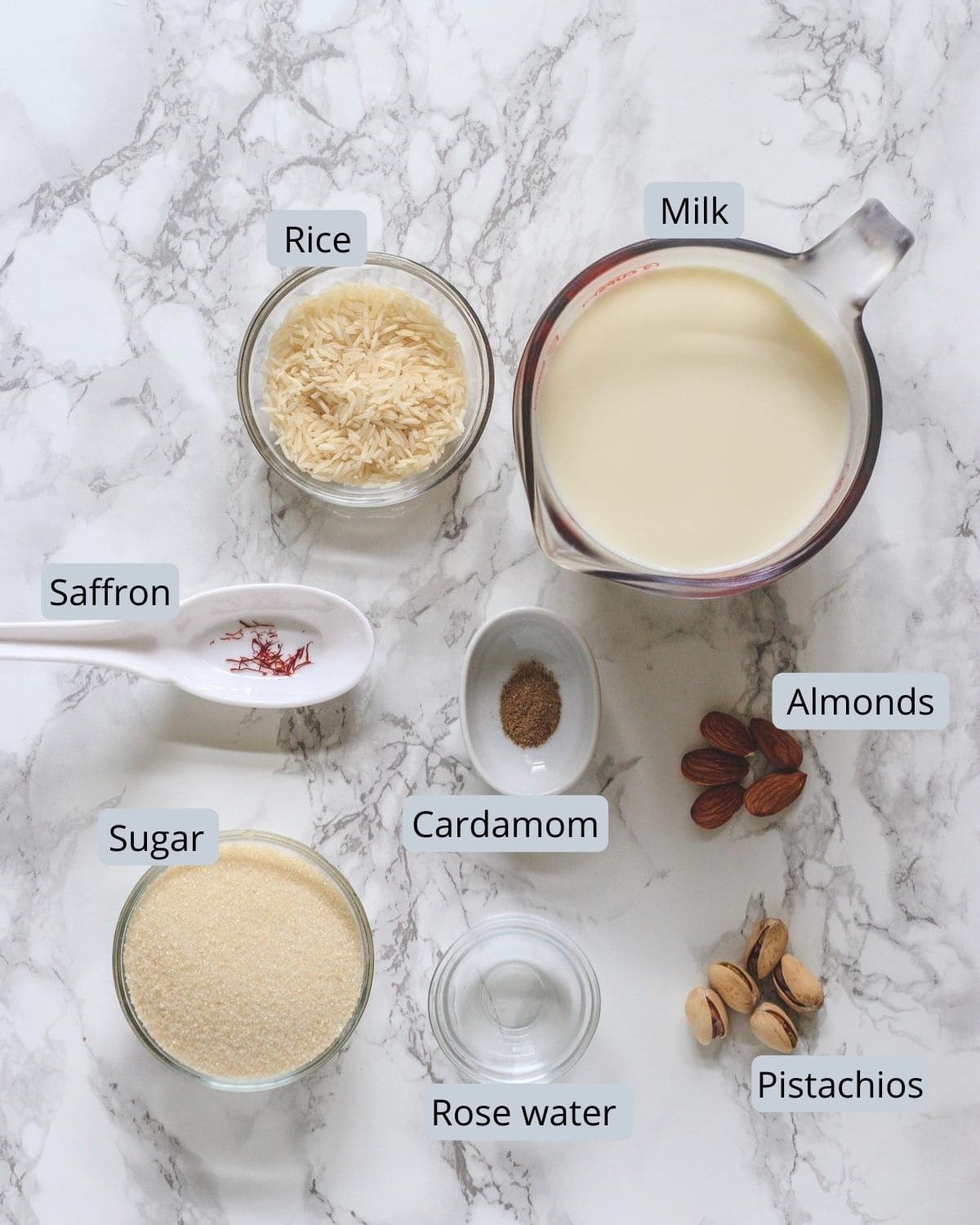 ingredients used in phirni includes milk, rice, sugar, cardamom, saffron, rose water, almonds, pistachios