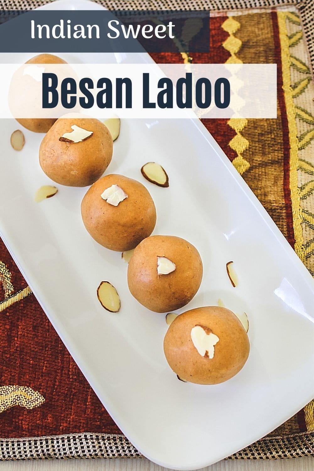 besan ladoo garnish with almonds on a plate with text on top of image