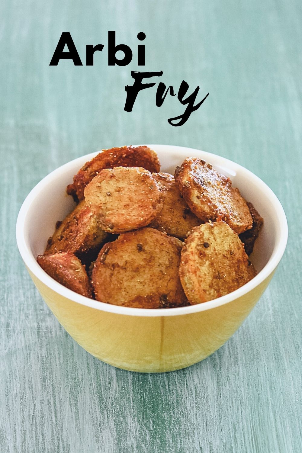 Arbi fry in a bowl with text on the image for pinterest