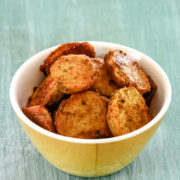 sukhi arbi fry served in a small yellow bowl