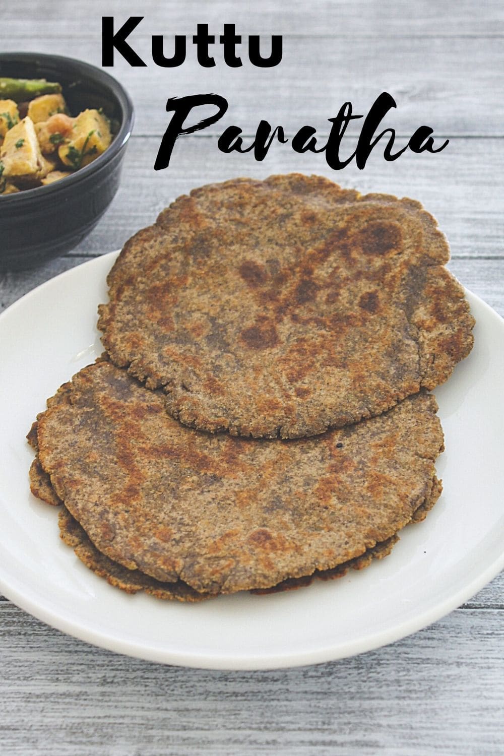 kuttu paratha in a plate with text on the image for pinterest.