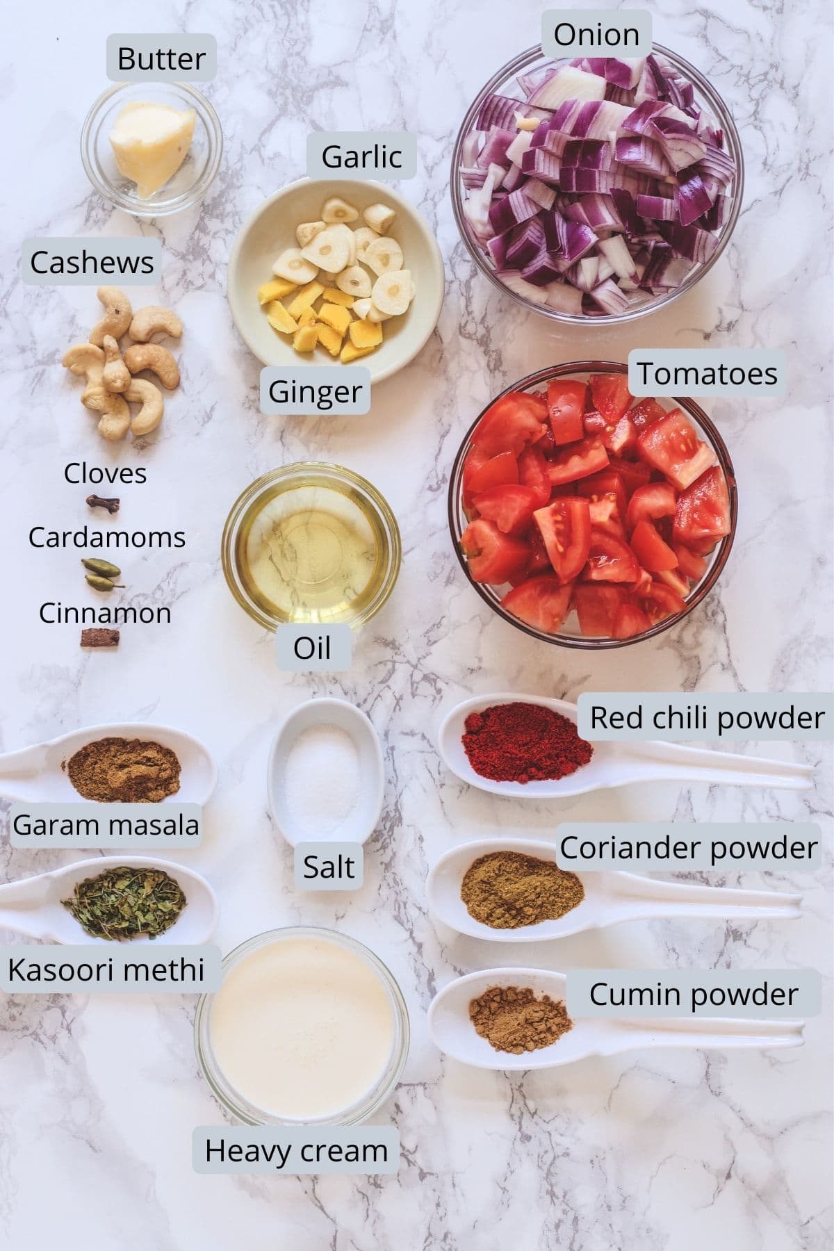 Ingredients used in the gravy includes onion, tomato, ginger, garlic, whole spices, cashews, oil, butter, salt, spice powders and cream