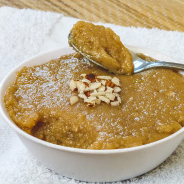 a spoon full ora rajgira halwa taken from the bowl and ready to eat