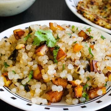 Sabudana khichdi in a plate with a garnish of cilantro