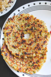 Close up of two thalipeeth in a plate