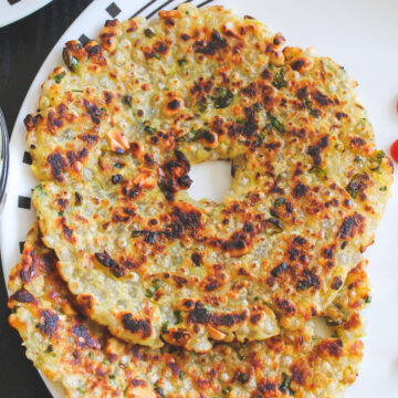 Close up of two thalipeeth in a plate